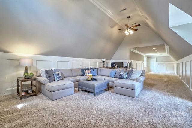 6216 N Rd, York, SC 29745 - living room featuring a decorative wall, carpet flooring, ceiling fan, lofted ceiling, and ornamental molding