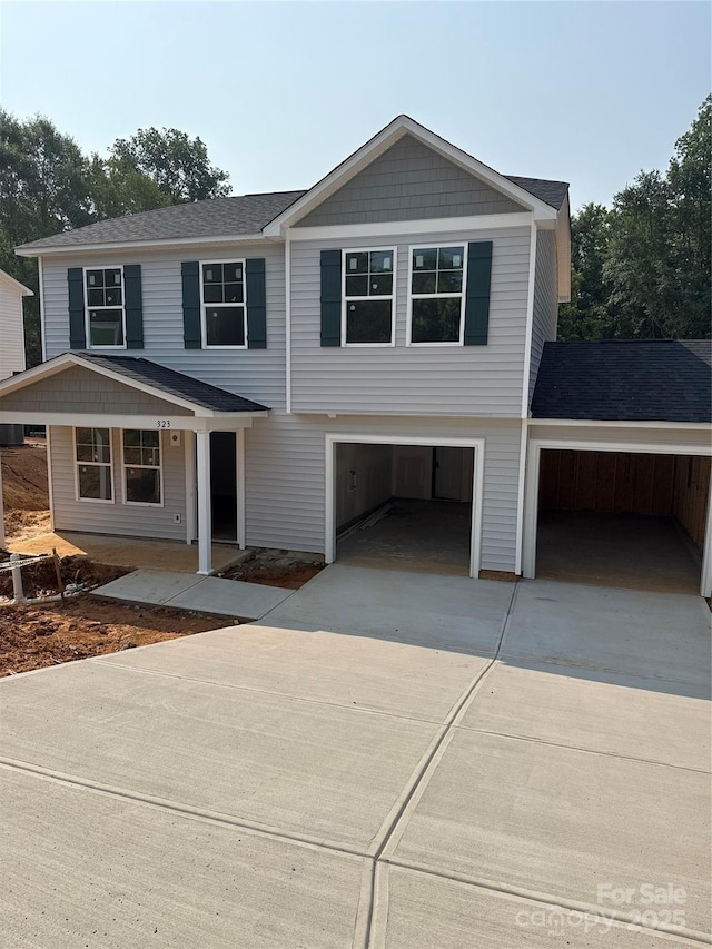 323 Conner St, Lancaster, SC 29720 - view of front facade featuring concrete driveway, an attached garage, a garage, and roof with shingles