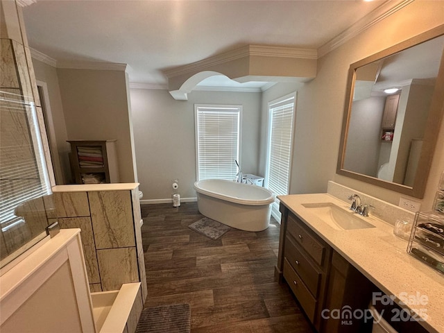 428 Long Branch Church Rd, Jefferson, SC 29718 - bathroom featuring vanity, a freestanding tub, wood finished floors, ornamental molding, and a tile shower