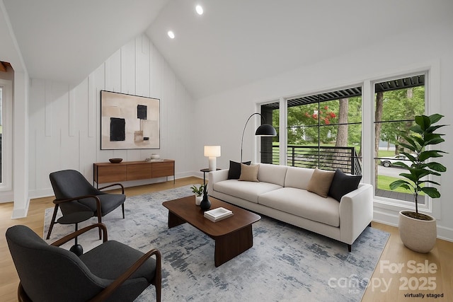 6501 Piney Path Rd, Charlotte, NC 28212 - living area featuring light wood-style floors, vaulted ceiling, and recessed lighting
