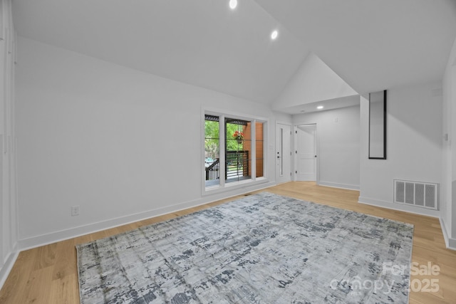 6501 Piney Path Rd, Charlotte, NC 28212 - unfurnished living room with light wood-type flooring, recessed lighting, and high vaulted ceiling