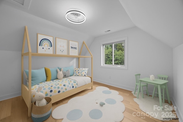 6501 Piney Path Rd, Charlotte, NC 28212 - bedroom featuring lofted ceiling and wood finished floors
