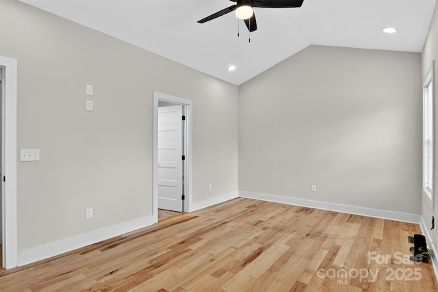 1019 Null Rd, Lincolnton, NC 28092 - empty room featuring a ceiling fan, light wood finished floors, lofted ceiling, and recessed lighting