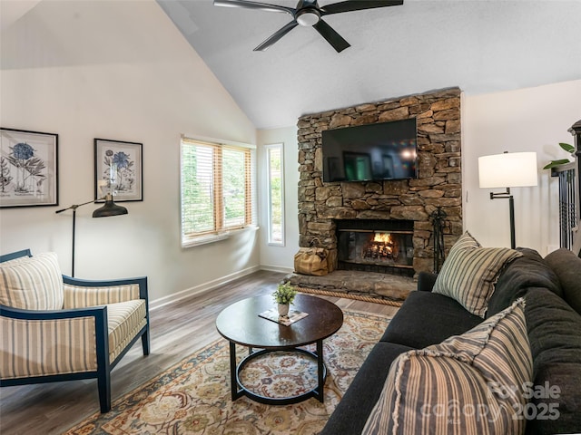 107 N Garden Ct, Fletcher, NC 28732 - living area featuring ceiling fan, wood finished floors, a fireplace, and high vaulted ceiling