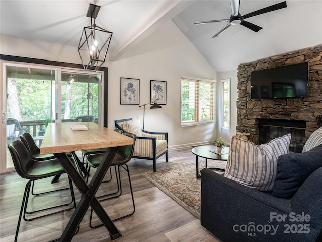 107 N Garden Ct, Fletcher, NC 28732 - living area featuring ceiling fan, a fireplace, high vaulted ceiling, and wood finished floors