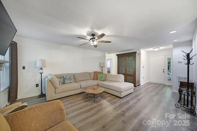 1003 Cranberry Cir, Fort Mill, SC 29715 - living room with a ceiling fan, wood finished floors, a textured ceiling, and recessed lighting