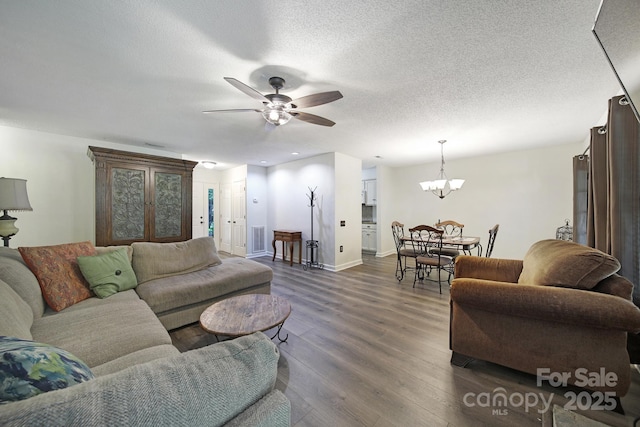 1003 Cranberry Cir, Fort Mill, SC 29715 - living room with a chandelier, ceiling fan, and dark wood-style floors