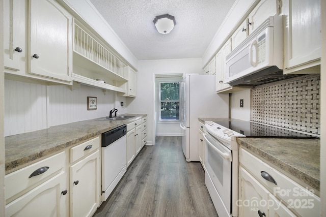 1003 Cranberry Cir, Fort Mill, SC 29715 - kitchen with white appliances, tasteful backsplash, a textured ceiling, open shelves, and dark wood finished floors