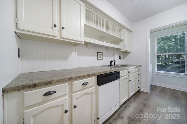 1003 Cranberry Cir, Fort Mill, SC 29715 - kitchen with white dishwasher, open shelves, wood finished floors, ornamental molding, and white cabinets