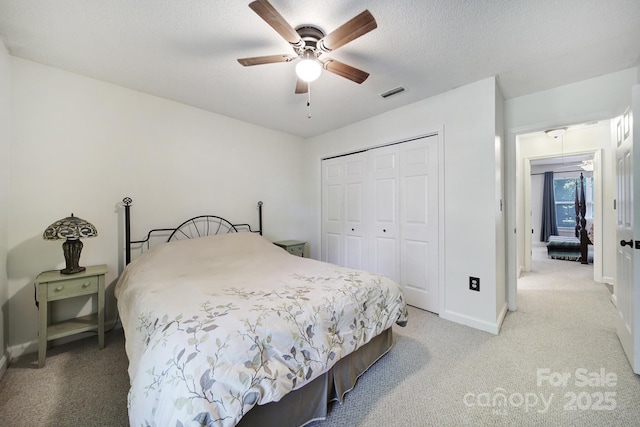 1003 Cranberry Cir, Fort Mill, SC 29715 - bedroom featuring light carpet, a closet, and ceiling fan