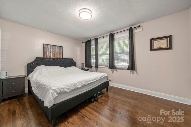 3130 Erskine Dr, Charlotte, NC 28205 - bedroom with a textured ceiling and wood finished floors