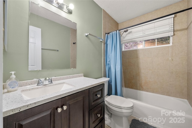 3130 Erskine Dr, Charlotte, NC 28205 - bathroom featuring vanity, shower / tub combo with curtain, and a textured ceiling