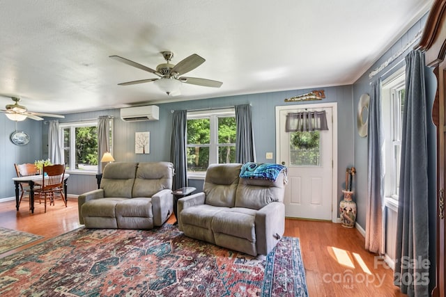 19 Lockman Rd, Maggie Valley, NC 28751 - living area with a wall mounted AC, ceiling fan, and wood finished floors