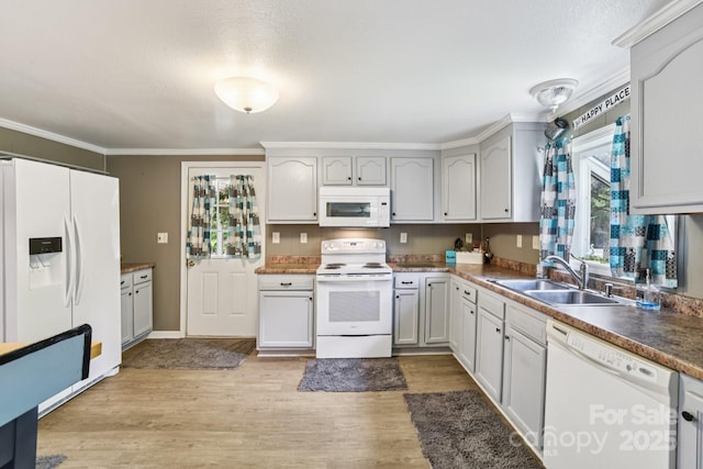 19 Lockman Rd, Maggie Valley, NC 28751 - kitchen with white appliances, ornamental molding, and light wood finished floors