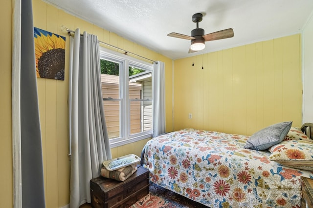 19 Lockman Rd, Maggie Valley, NC 28751 - bedroom featuring a ceiling fan and wooden walls