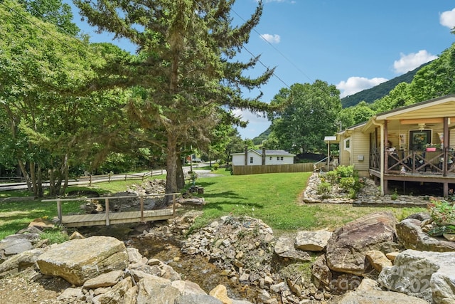 19 Lockman Rd, Maggie Valley, NC 28751 - view of yard with a deck with mountain view