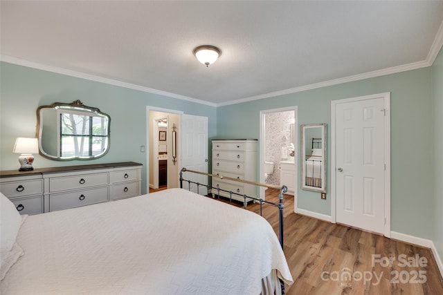353 Tall Oaks Trl, Fort Mill, SC 29715 - bedroom featuring crown molding, connected bathroom, and light wood-style flooring