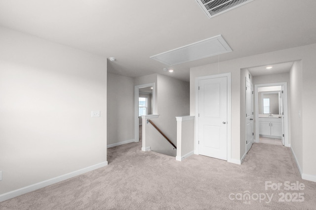 1022 Jeffery Dean Ct, Albemarle, NC 28001 - empty room featuring attic access, light carpet, recessed lighting, and a smoke detector