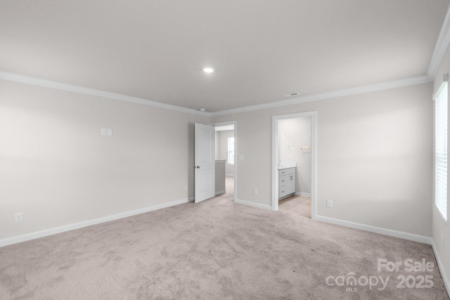 1022 Jeffery Dean Ct, Albemarle, NC 28001 - unfurnished bedroom featuring ornamental molding, light colored carpet, multiple windows, connected bathroom, and recessed lighting