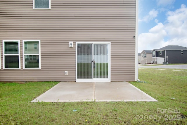 1022 Jeffery Dean Ct, Albemarle, NC 28001 - rear view of house featuring a patio and a yard
