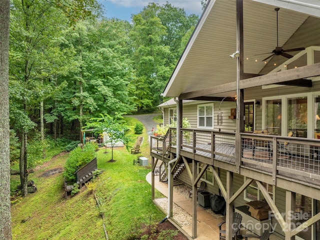 21 Fern Haven Ln, Fairview, NC 28730 - view of green lawn with a deck and a ceiling fan