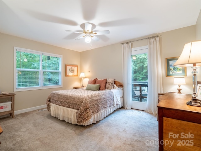21 Fern Haven Ln, Fairview, NC 28730 - bedroom with access to outside, light carpet, and a ceiling fan