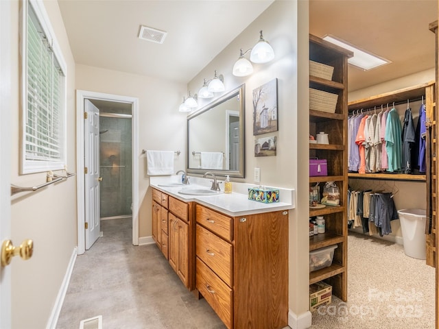 21 Fern Haven Ln, Fairview, NC 28730 - full bathroom with a shower stall, vanity, and a walk in closet