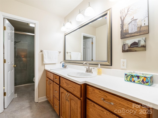 21 Fern Haven Ln, Fairview, NC 28730 - bathroom with double vanity, tile patterned flooring, and a shower stall