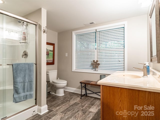 21 Fern Haven Ln, Fairview, NC 28730 - bathroom featuring vanity, wood finished floors, and a shower stall