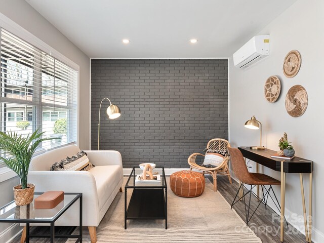 2000 Patio Ct Unit 101, 105, 125, Charlotte, NC 28205 - sitting room with brick wall, an AC wall unit, an accent wall, wood finished floors, and recessed lighting