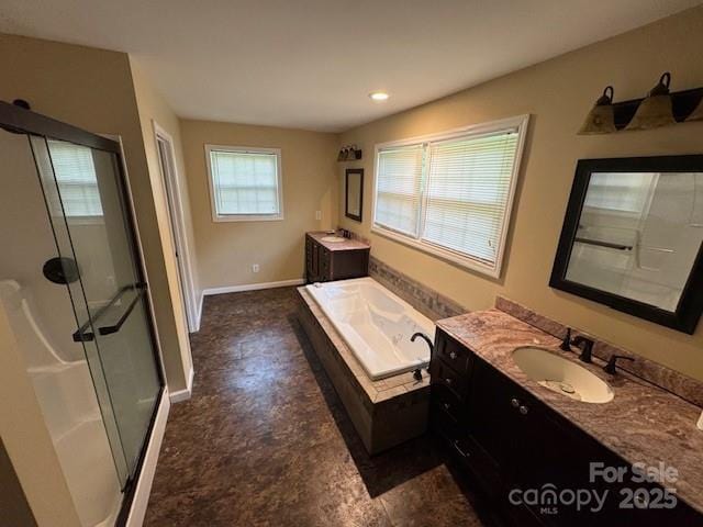 2116 Dana Pl, Shelby, NC 28152 - full bath with a shower stall, two vanities, a garden tub, and recessed lighting