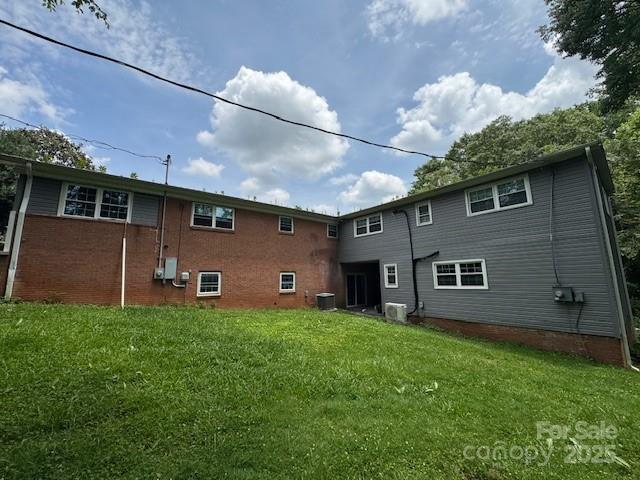 2116 Dana Pl, Shelby, NC 28152 - rear view of house with a yard and brick siding