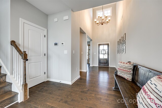 3041 Winged Teal Ct, Belmont, NC 28012 - foyer with a chandelier, wood finished floors, and stairway