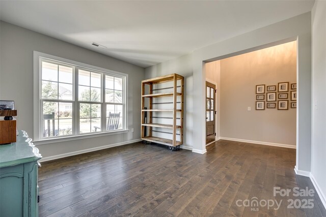 3041 Winged Teal Ct, Belmont, NC 28012 - empty room with dark wood-type flooring and baseboards