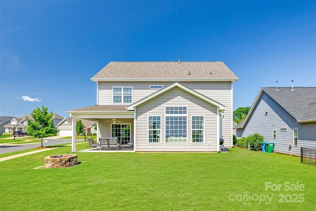 3041 Winged Teal Ct, Belmont, NC 28012 - rear view of property with a fire pit, a ceiling fan, a lawn, and a patio