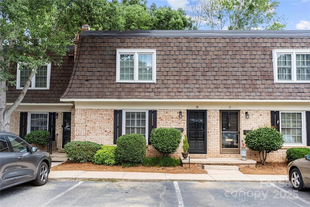 3500 Colony Rd Unit B, Charlotte, NC 28211 - multi unit property featuring mansard roof, brick siding, uncovered parking, and a shingled roof