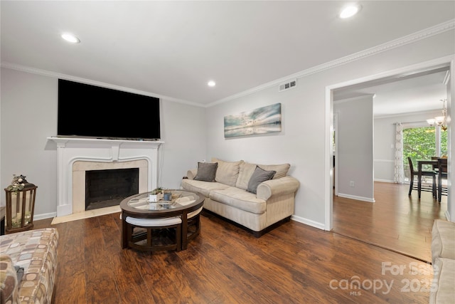3500 Colony Rd Unit B, Charlotte, NC 28211 - living area with wood finished floors, ornamental molding, recessed lighting, a premium fireplace, and a chandelier