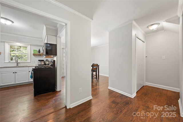 3500 Colony Rd Unit B, Charlotte, NC 28211 - hall featuring dark wood finished floors and ornamental molding