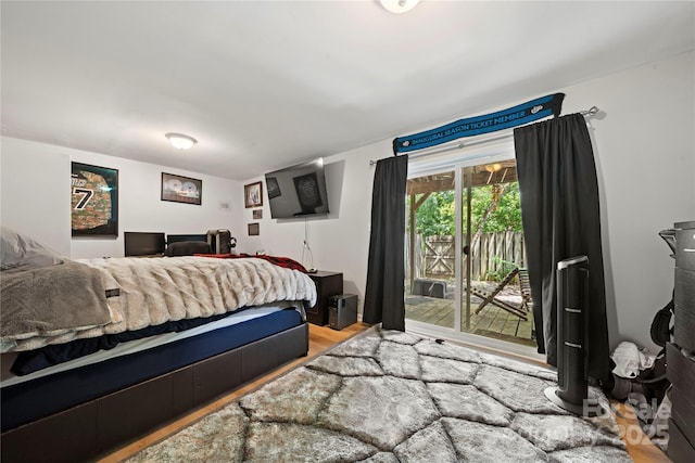 3500 Colony Rd Unit B, Charlotte, NC 28211 - bedroom featuring access to exterior and wood finished floors