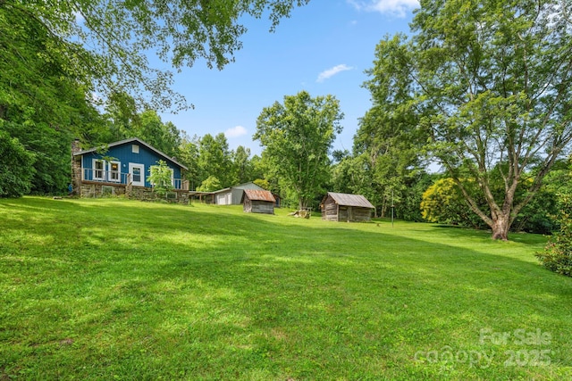 2428 Hamburg Rd, Mars Hill, NC 28754 - view of green lawn featuring an outdoor structure