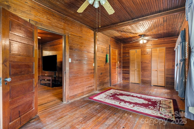 2428 Hamburg Rd, Mars Hill, NC 28754 - unfurnished room with ceiling fan, wood walls, hardwood / wood-style floors, and wooden ceiling