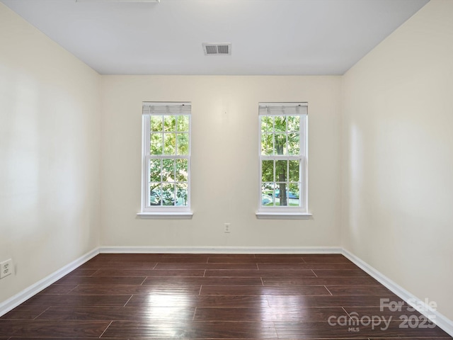 216 Devon Forest Dr, Mooresville, NC 28115 - empty room featuring plenty of natural light and hardwood / wood-style floors