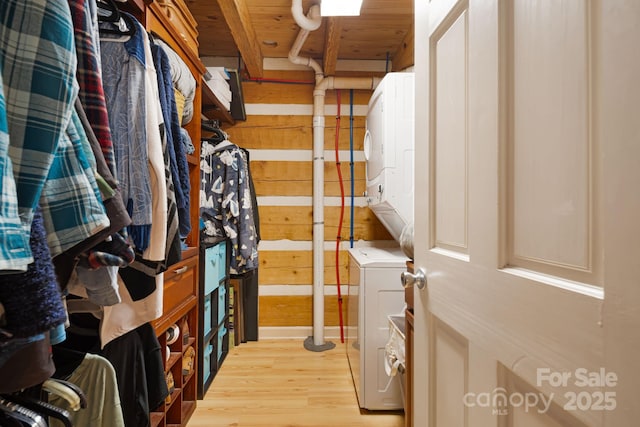 1980 Old Murray Rd, Mars Hill, NC 28754 - spacious closet with stacked washer / dryer and light wood finished floors