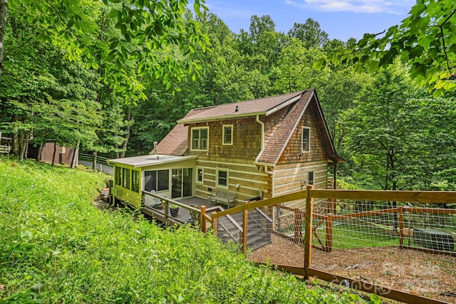 1980 Old Murray Rd, Mars Hill, NC 28754 - back of house featuring a sunroom and roof with shingles