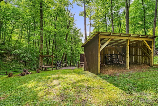1980 Old Murray Rd, Mars Hill, NC 28754 - view of green lawn featuring a pole building, a detached carport, and an outdoor structure