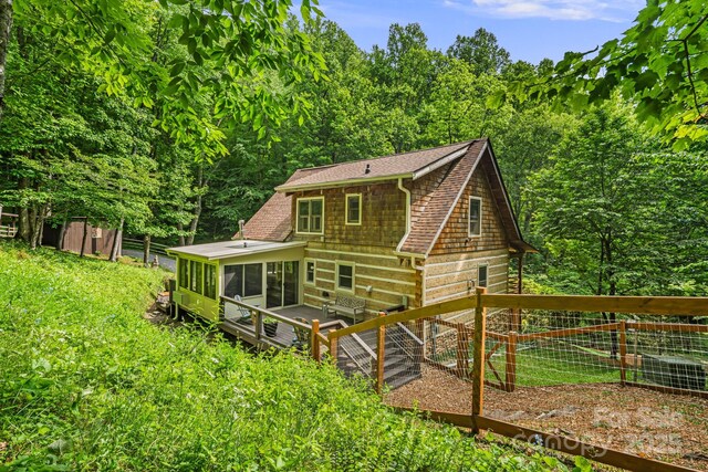 1980 Old Murray Rd, Mars Hill, NC 28754 - rear view of house with a sunroom and a shingled roof