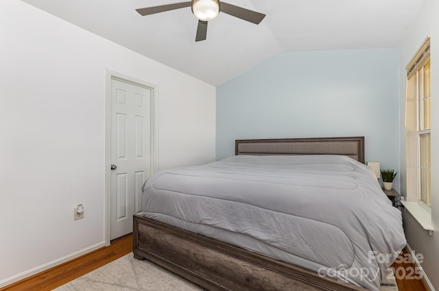 409 Lexie Ln, Rock Hill, SC 29732 - bedroom with wood finished floors, lofted ceiling, and a ceiling fan
