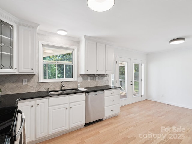 10728 Forest Dr, Matthews, NC 28105 - kitchen featuring stainless steel appliances, decorative backsplash, white cabinetry, and crown molding