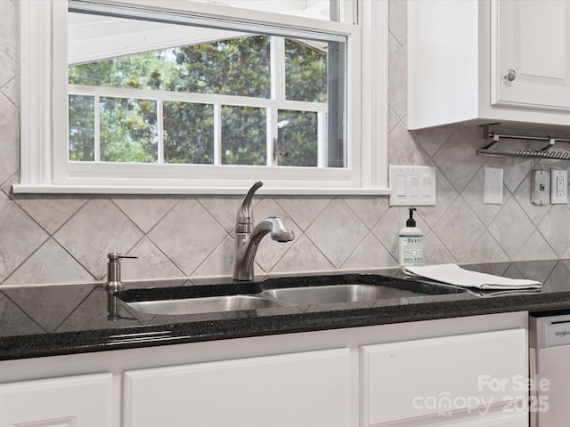 10728 Forest Dr, Matthews, NC 28105 - kitchen with dishwasher, white cabinetry, tasteful backsplash, and healthy amount of natural light