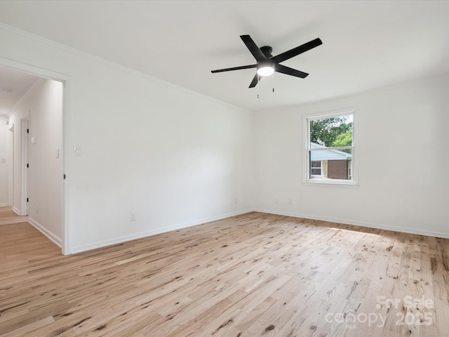 10728 Forest Dr, Matthews, NC 28105 - unfurnished room with light wood-style floors, ornamental molding, and ceiling fan